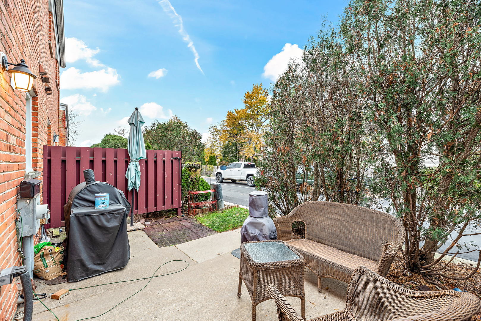 2142 Rugen Road, Unit C Glenview, IL 60026 - Photo 20 of 24 a view of a chairs and tables in the back yard of the house