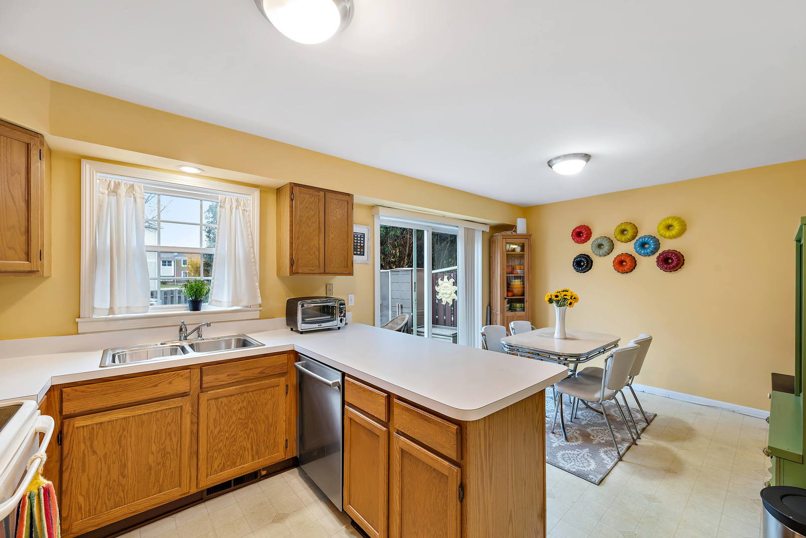 2142 Rugen Road, Unit C Glenview, IL 60026 - Photo 7 of 24 a bathroom with a sink and a large mirror
