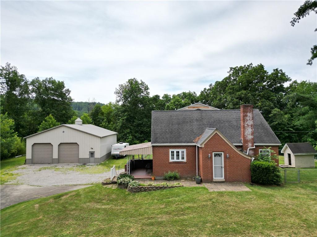 57 Cracker Jack Road Monongahela, PA 15063 - Photo 1 of 25 a front view of house with yard and garage