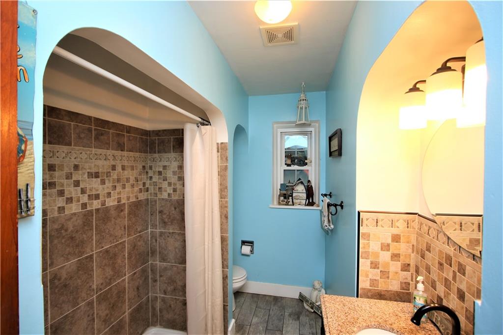 57 Cracker Jack Road Monongahela, PA 15063 - Photo 12 of 25 a bathroom with a granite countertop window and a shower