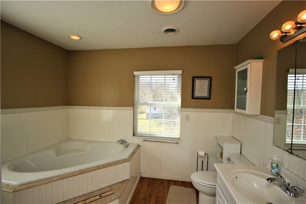 57 Cracker Jack Road Monongahela, PA 15063 - Photo 14 of 25 a bathroom with a tub a sink and a window