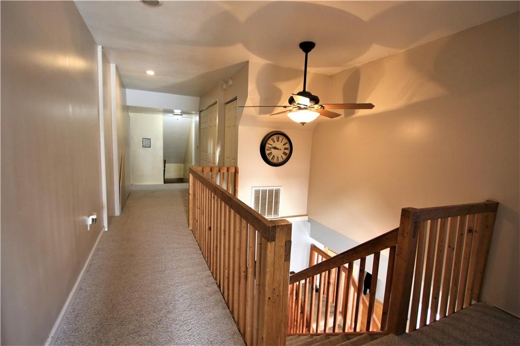 57 Cracker Jack Road Monongahela, PA 15063 - Photo 19 of 25 a view of a hallway with a chandelier