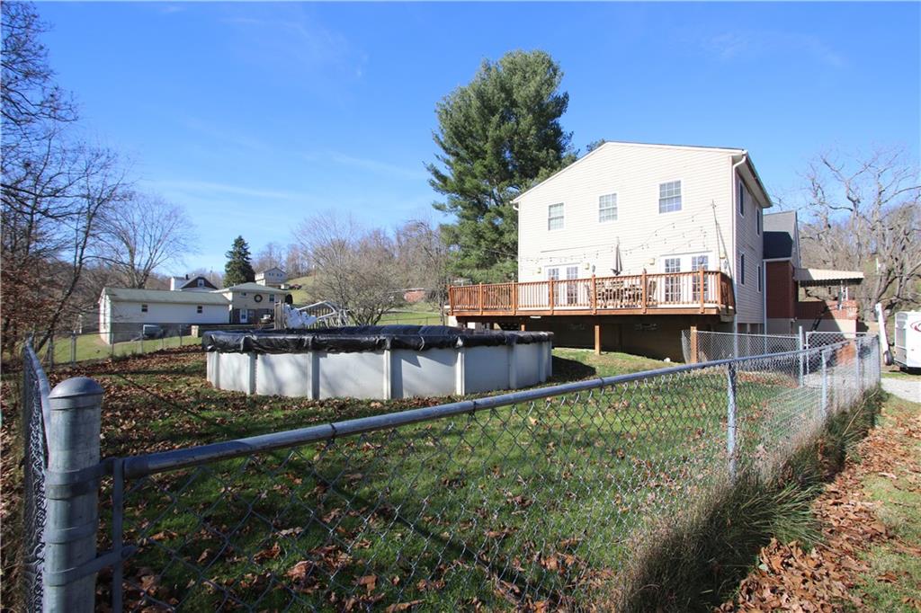57 Cracker Jack Road Monongahela, PA 15063 - Photo 21 of 25 a view of house with outdoor space and swimming pool