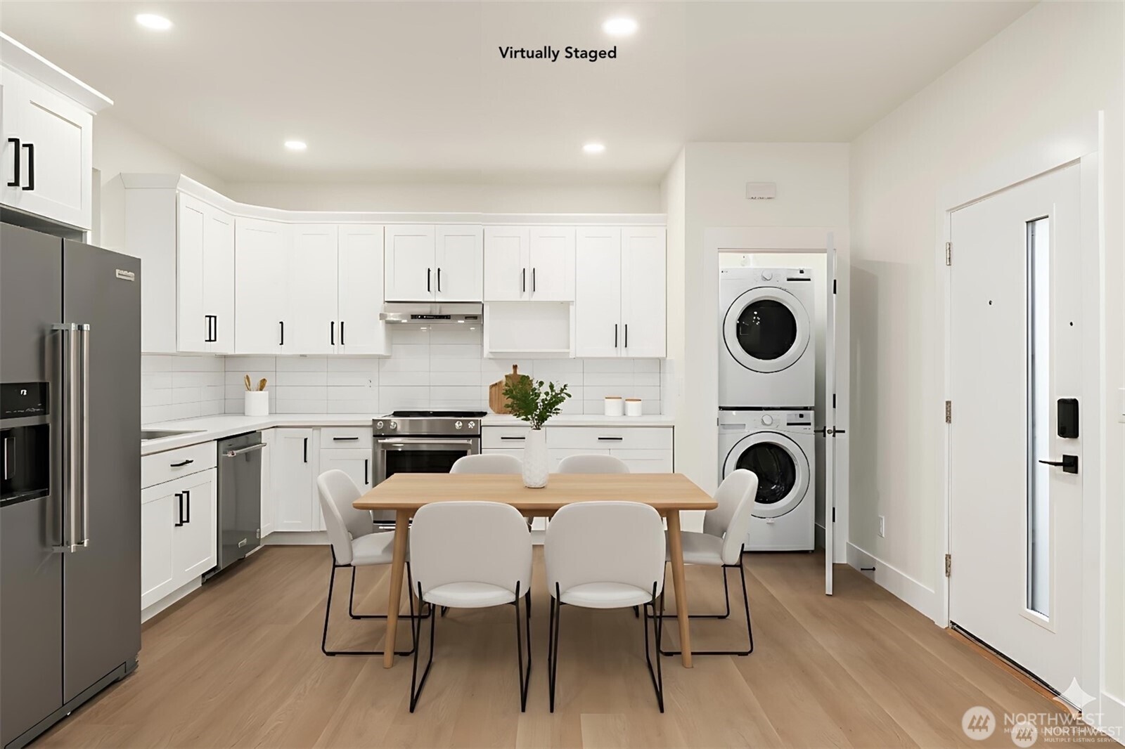 3817 Letitia Avenue South Seattle, WA 98118 - Photo 3 of 16 a kitchen with a refrigerator a stove top oven a sink and a refrigerator