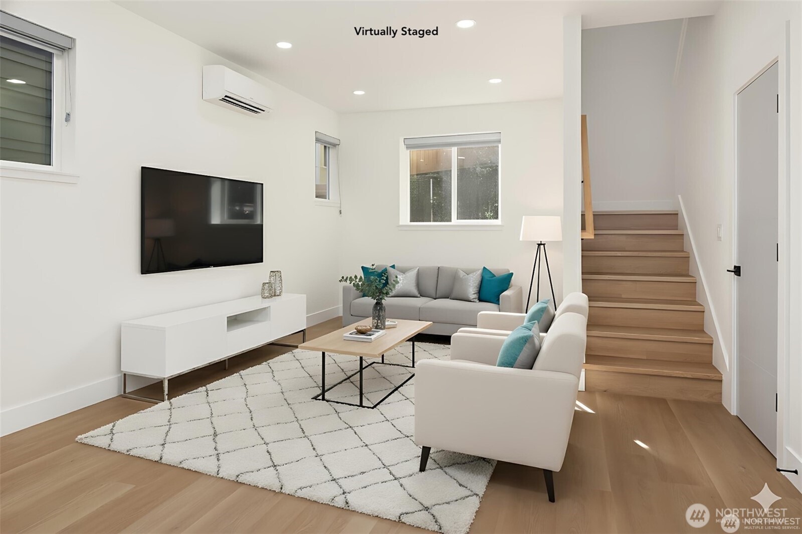 3817 Letitia Avenue South Seattle, WA 98118 - Photo 5 of 16 a living room with furniture and a flat screen tv