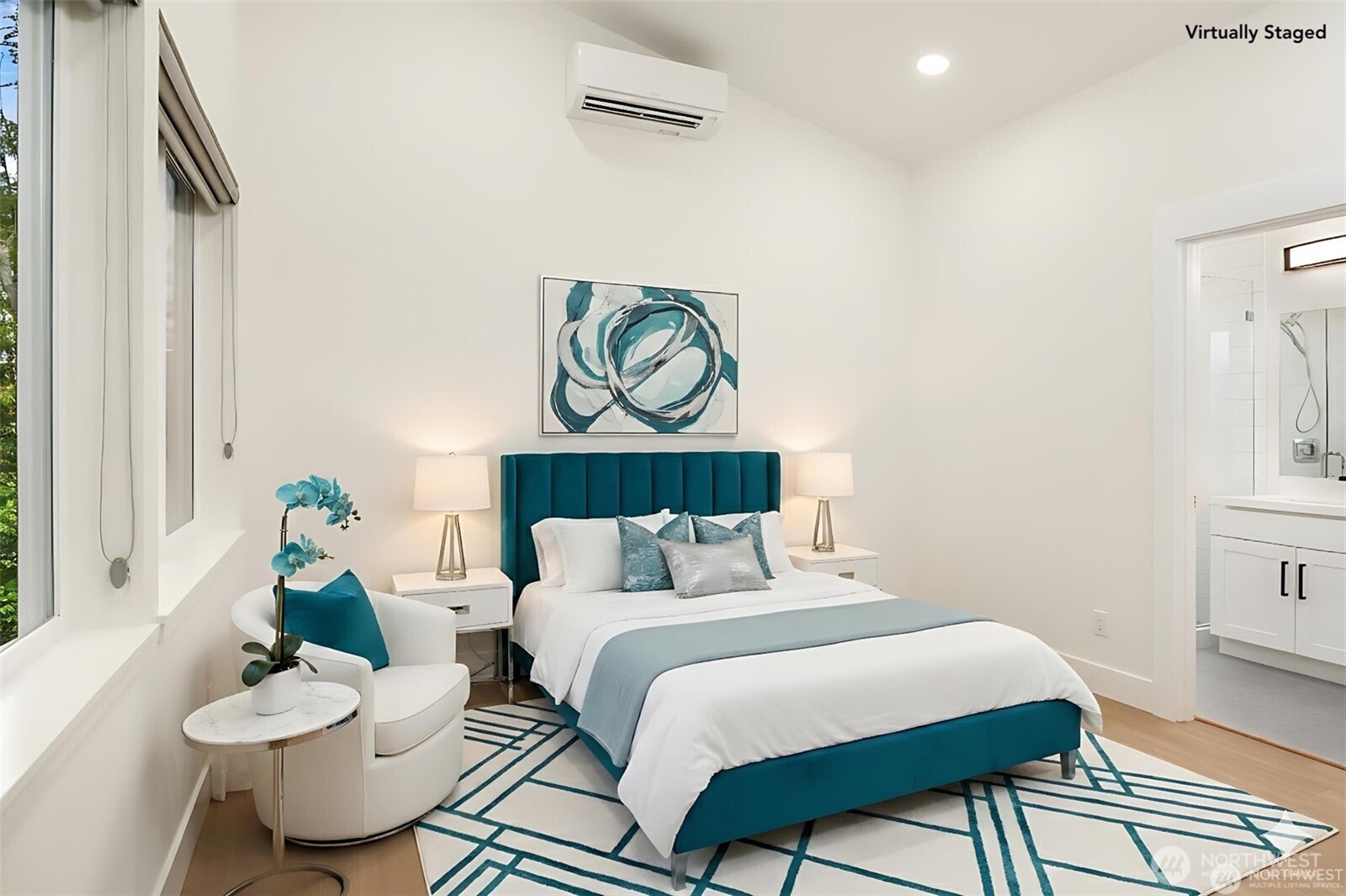 3817 Letitia Avenue South Seattle, WA 98118 - Photo 7 of 16 a bedroom with a bed and wooden floor