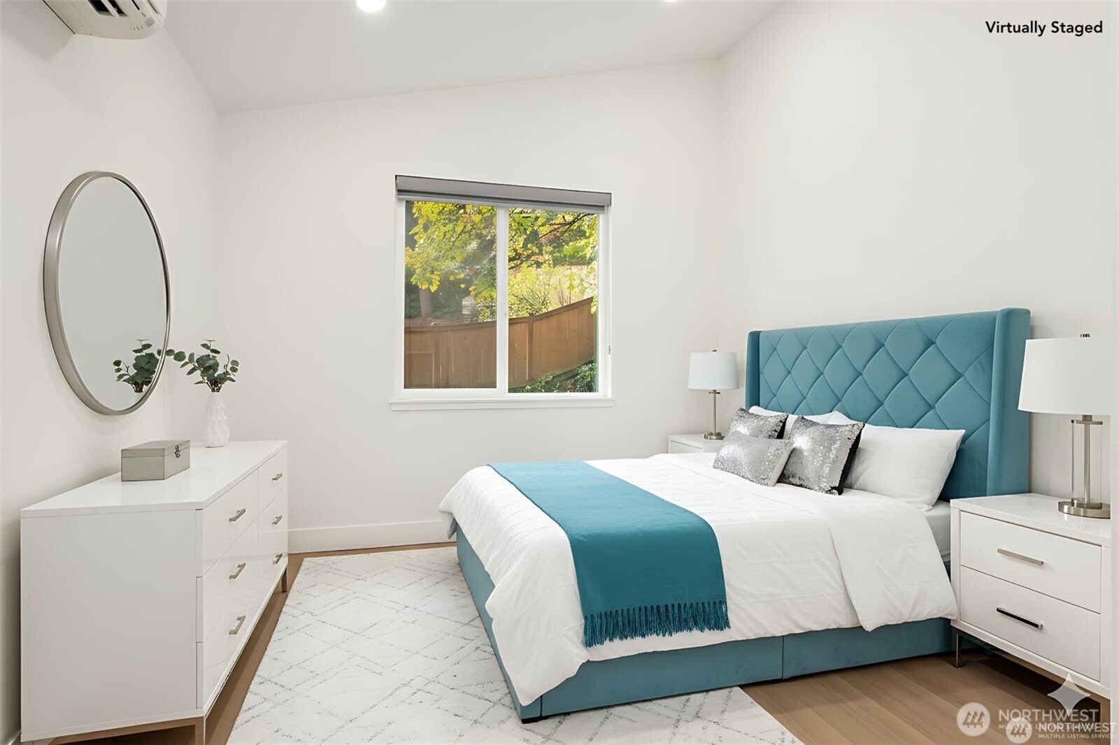 3817 Letitia Avenue South Seattle, WA 98118 - Photo 9 of 16 a bedroom with a bed and a window