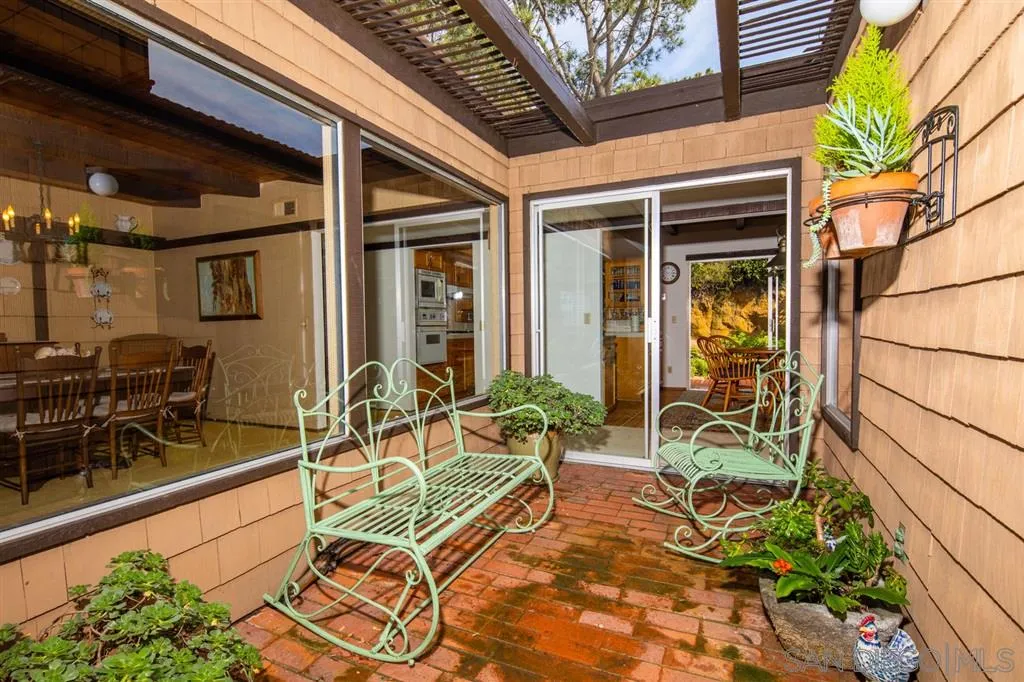 692 Rimini Road Del Mar, CA 92014 - Photo 12 of 25 a building outdoor space with patio furniture