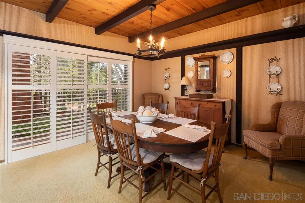 692 Rimini Road Del Mar, CA 92014 - Photo 13 of 25 a view of a dining room with furniture window and outside view