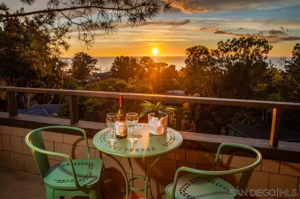 692 Rimini Road Del Mar, CA 92014 - Photo 21 of 25 a view of a chairs and table in the balcony