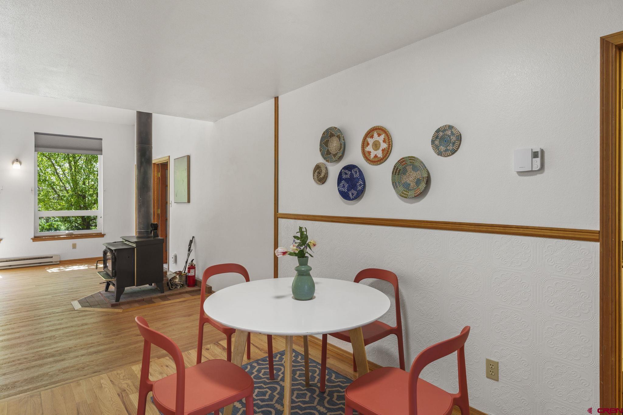 37 Verde Lane Durango, CO 81301 - Photo 12 of 45 a view of a dining room with furniture and a window