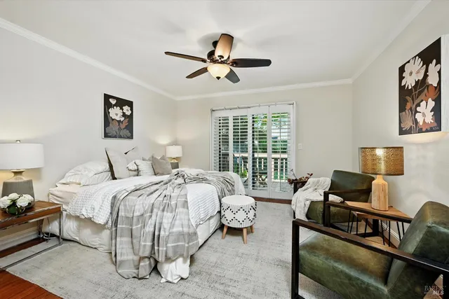 a bedroom with a bed and a couch