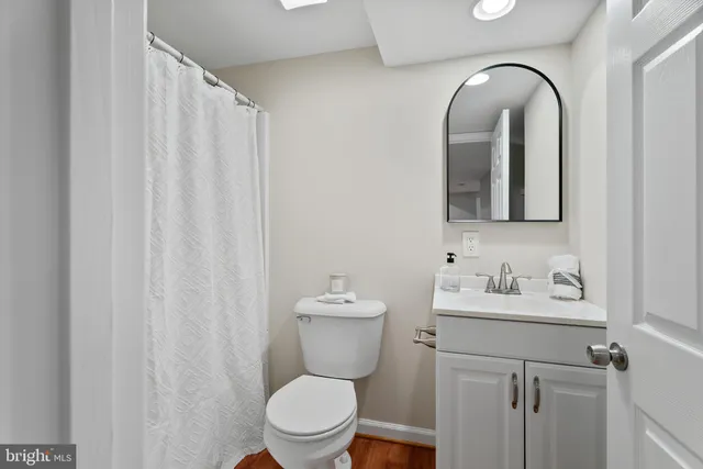 a view of empty room with chairs