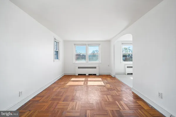 an empty room with windows
