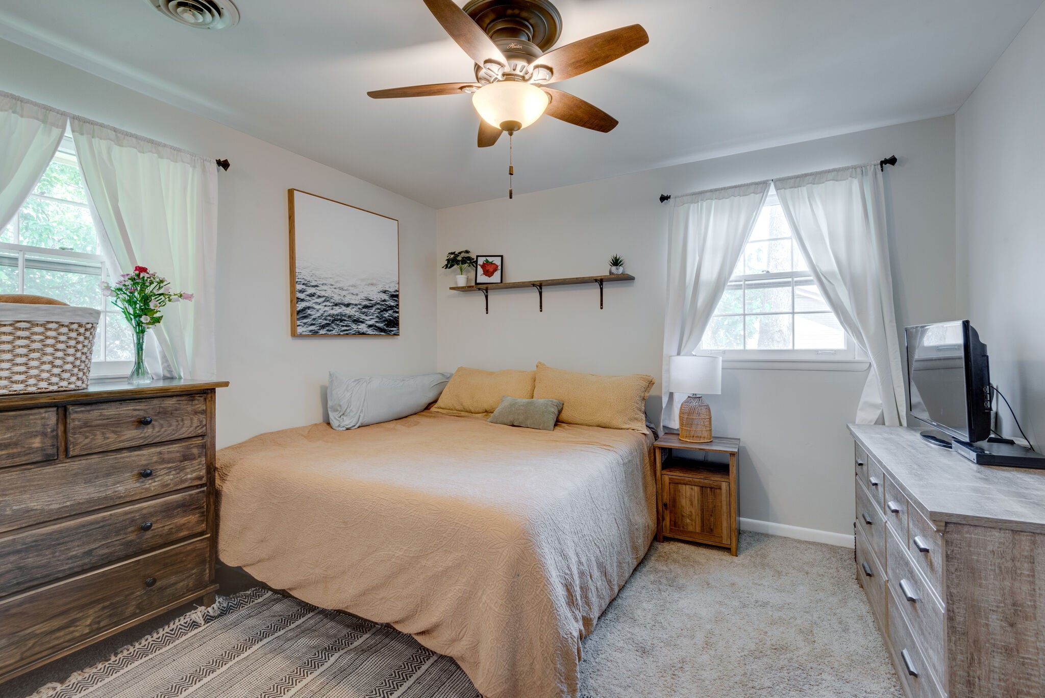 249 Bart Drive Antioch, TN 37013 - Photo 11 of 28 a bedroom with a bed and a flat screen tv