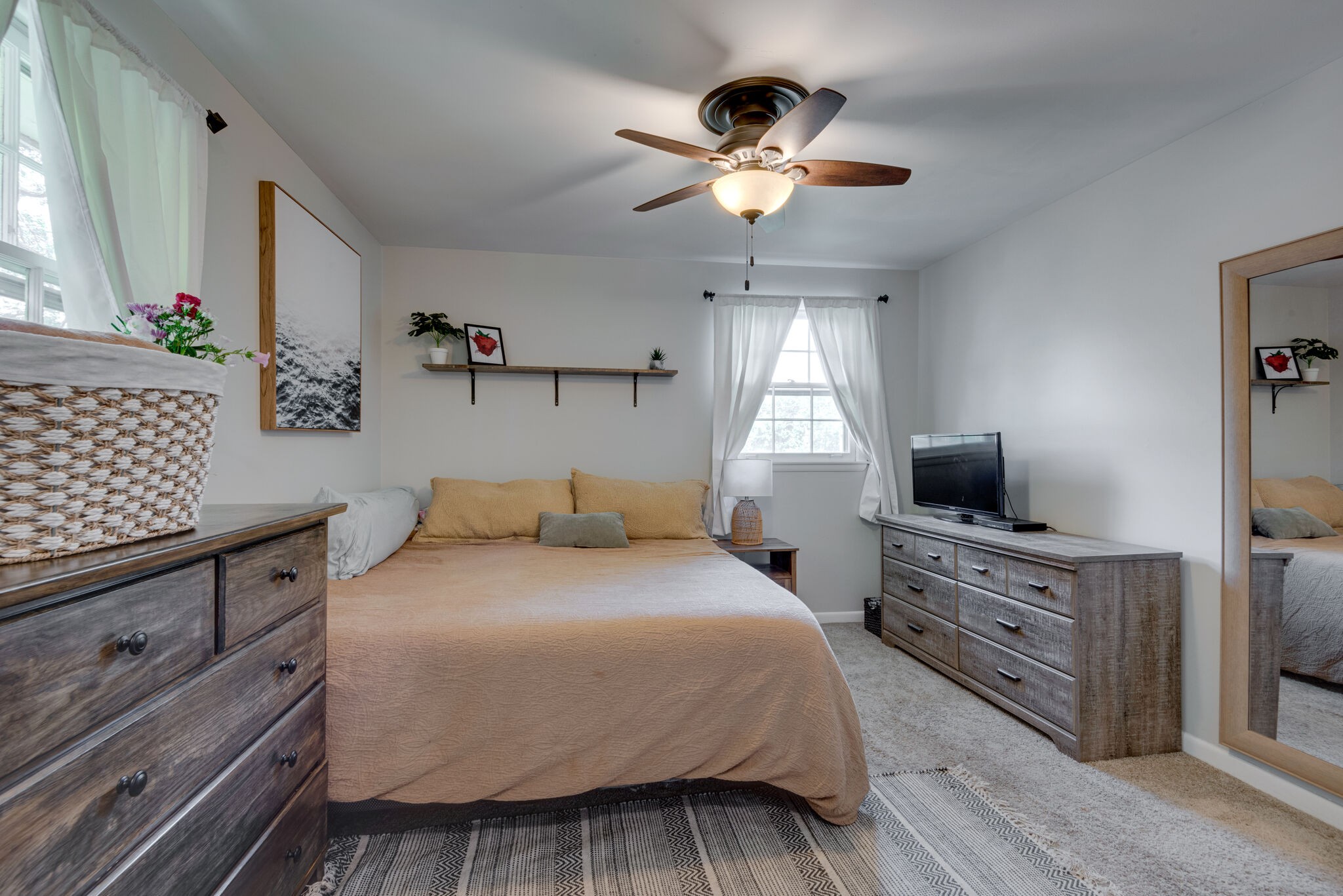 249 Bart Drive Antioch, TN 37013 - Photo 12 of 28 a bedroom with a bed and a tv on the dresser