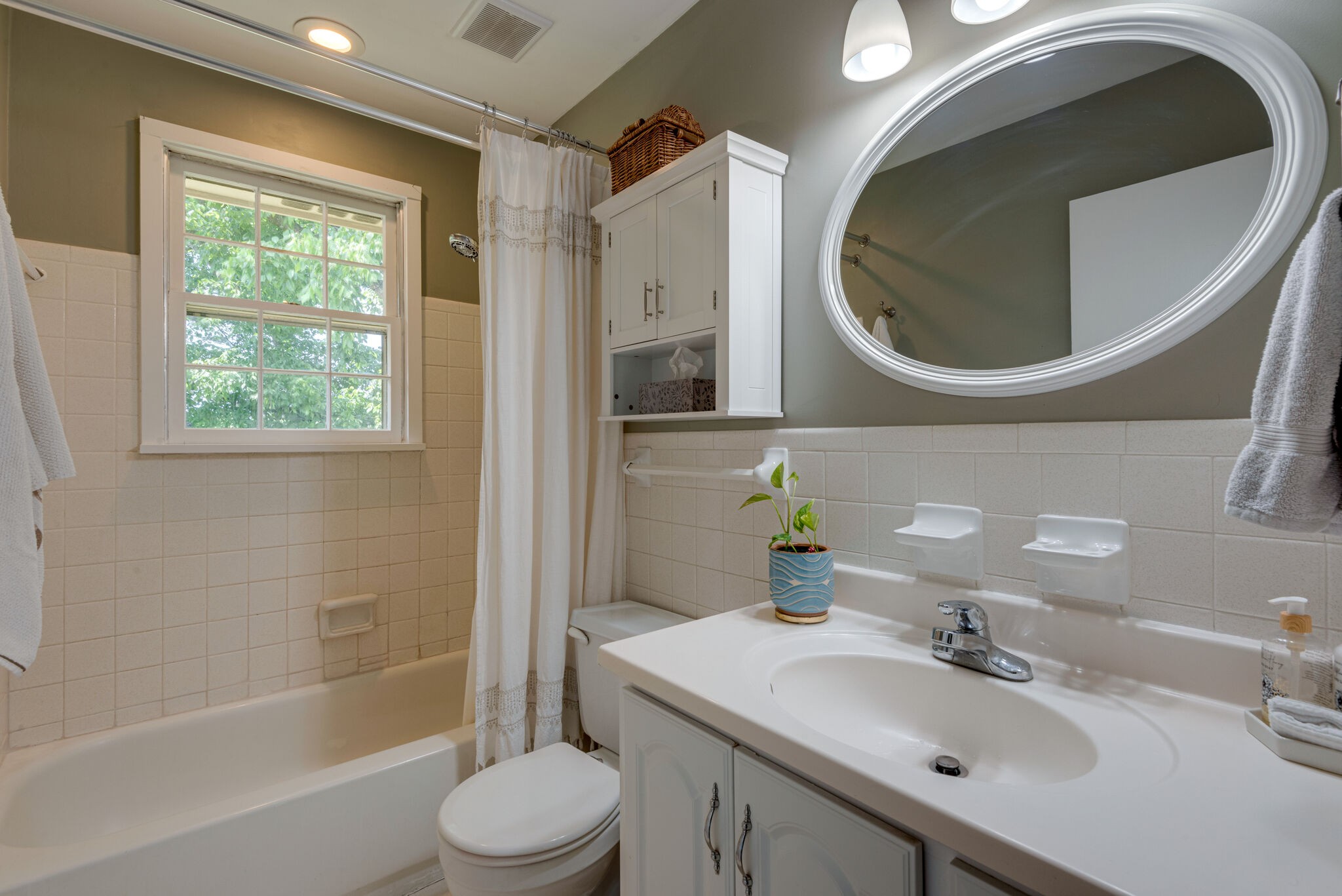 249 Bart Drive Antioch, TN 37013 - Photo 20 of 28 a bathroom with a sink toilet and shower