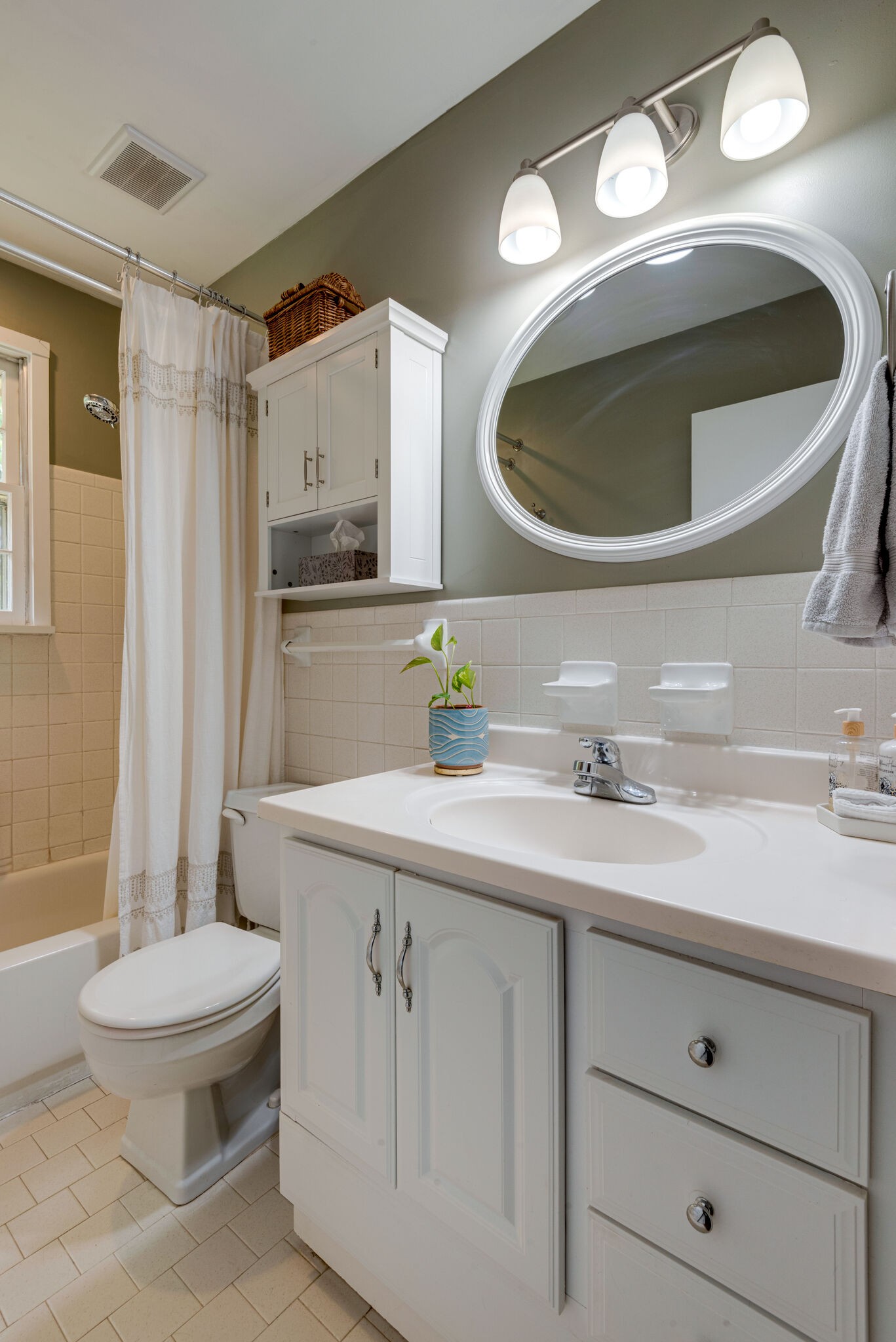 249 Bart Drive Antioch, TN 37013 - Photo 21 of 28 a bathroom with a toilet sink and mirror