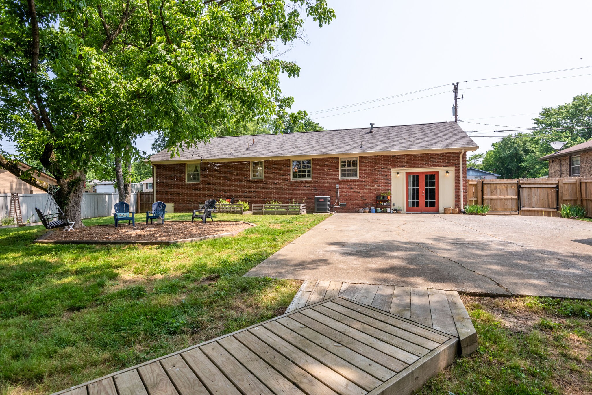 249 Bart Drive Antioch, TN 37013 - Photo 25 of 28 a view of a house with pool and a yard