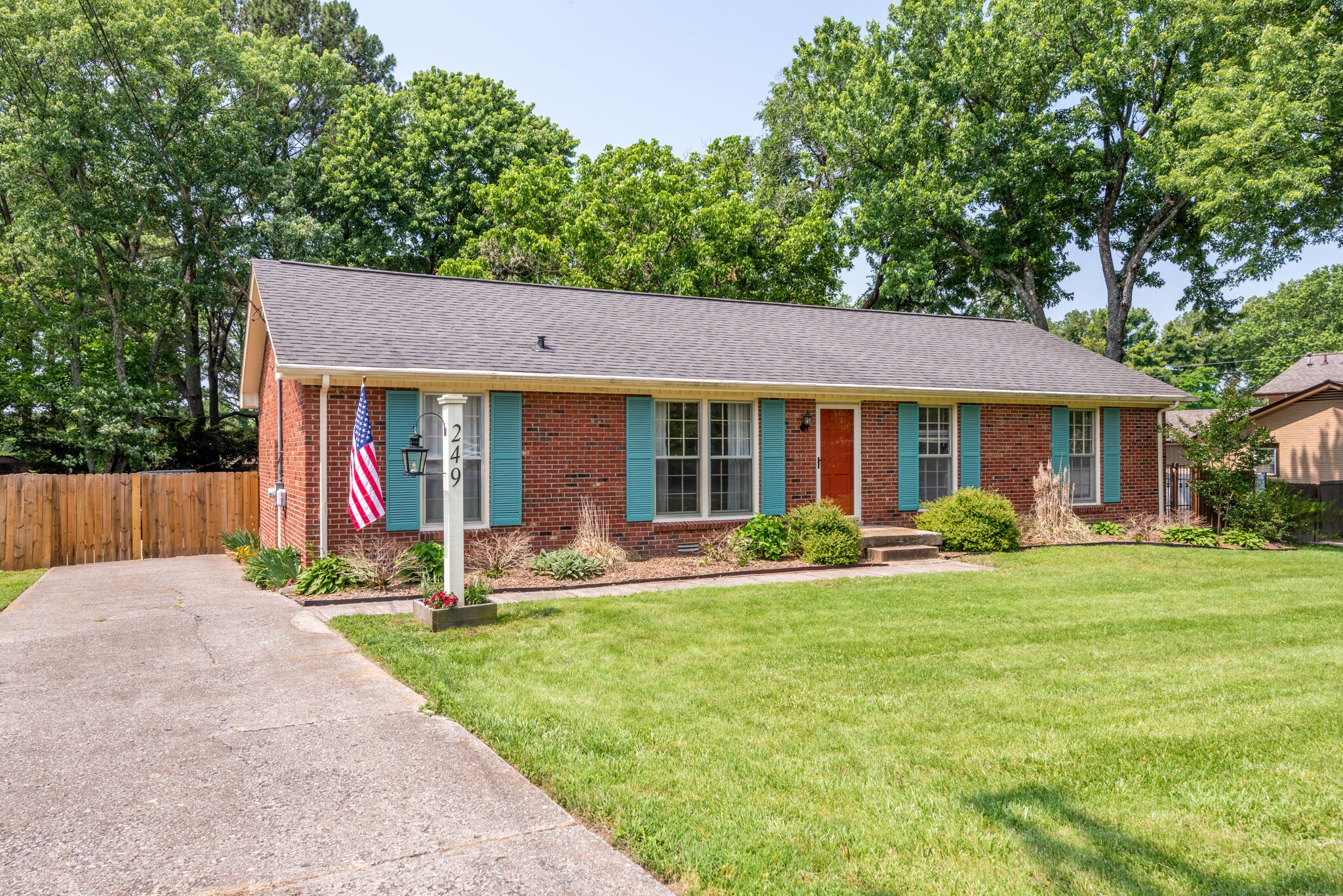 249 Bart Drive Antioch, TN 37013 - Photo 3 of 28 a view of a house with a yard and sitting area