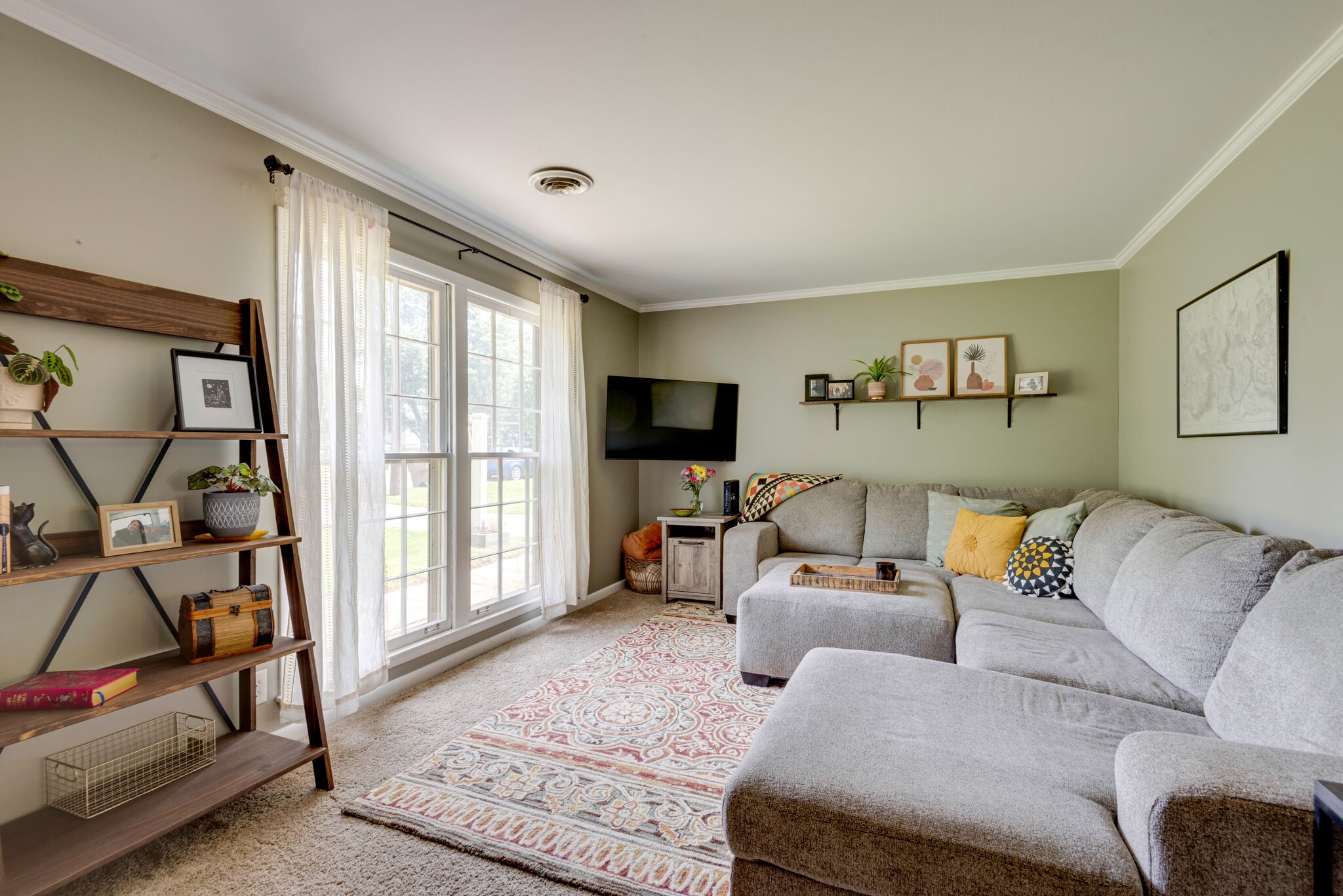 249 Bart Drive Antioch, TN 37013 - Photo 4 of 28 a living room with furniture and a flat screen tv