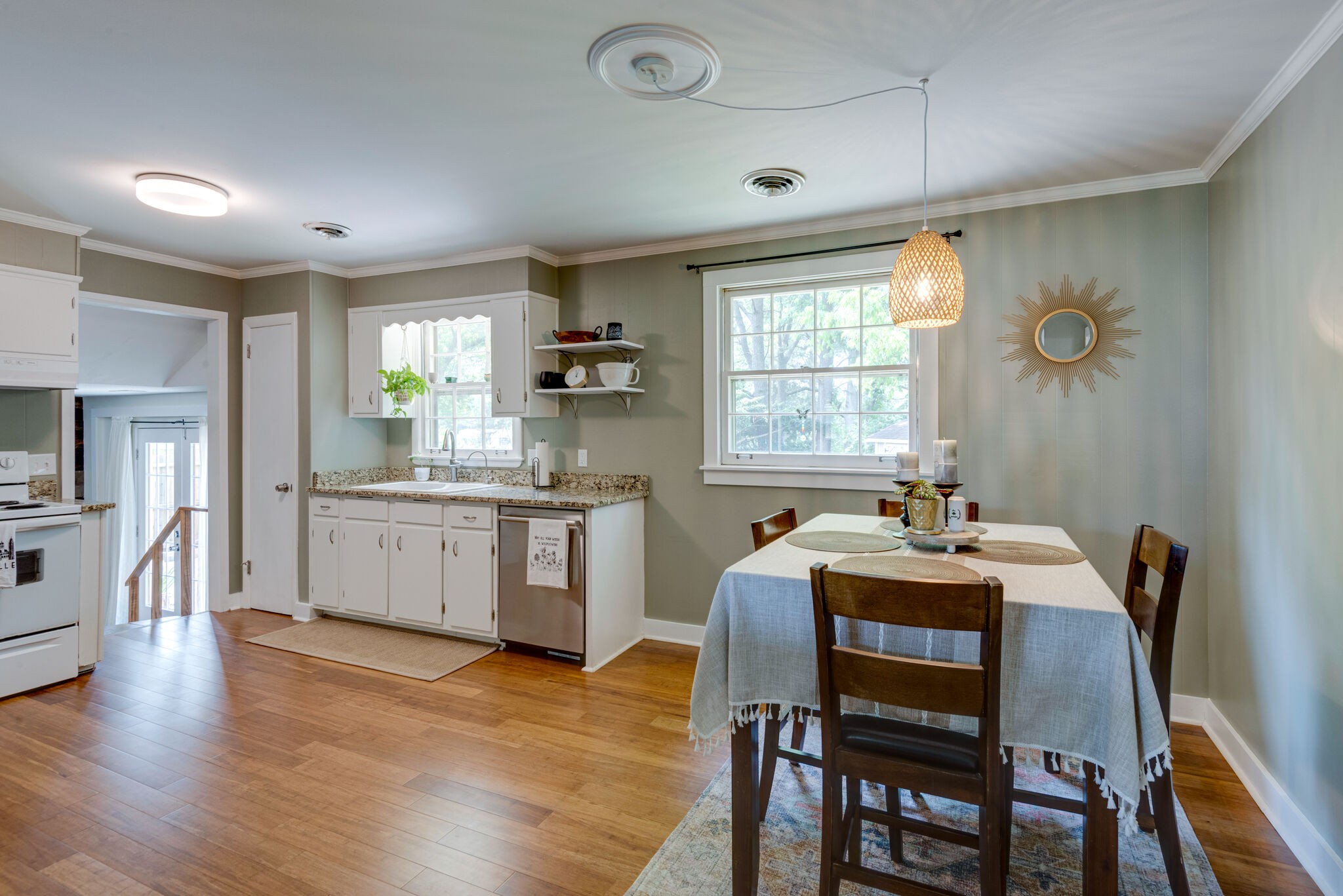249 Bart Drive Antioch, TN 37013 - Photo 7 of 28 a kitchen with granite countertop white cabinets and counter space