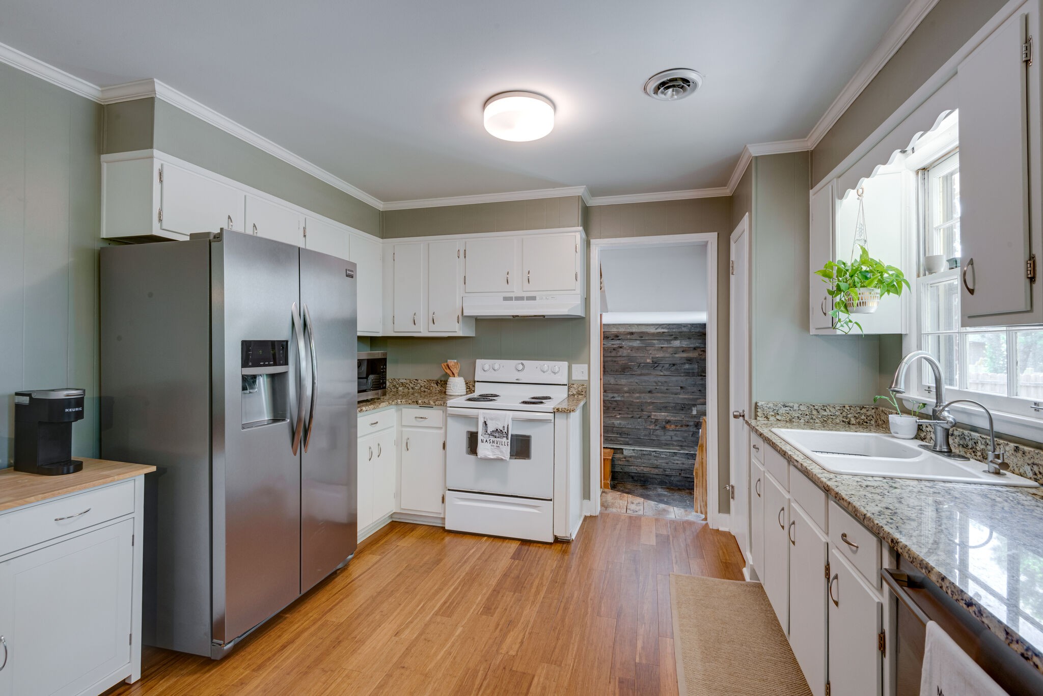249 Bart Drive Antioch, TN 37013 - Photo 9 of 28 a kitchen with stainless steel appliances a refrigerator sink and stove