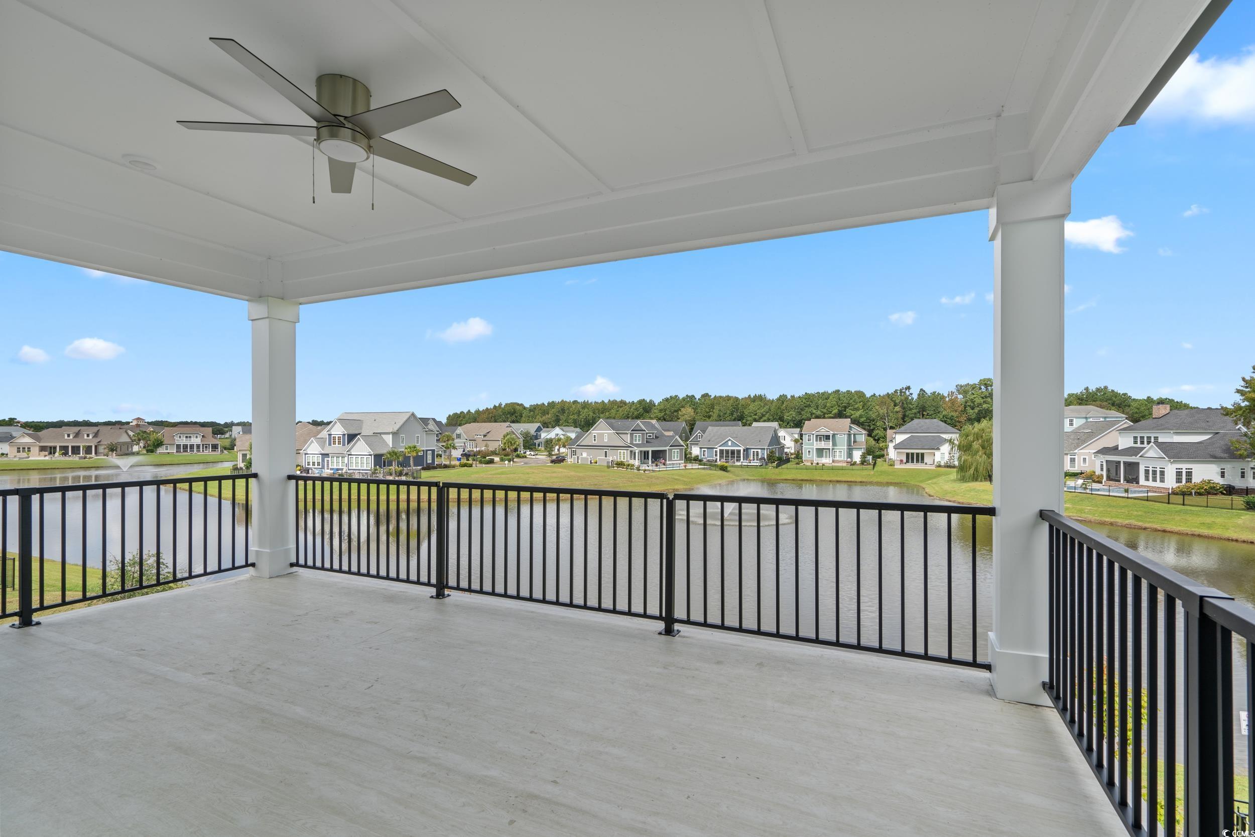 921 Crystal Water Way Myrtle Beach, SC 29579 - Photo 19 of 36 View of patio / terrace featuring a water view, a ceiling fan, and a residential view