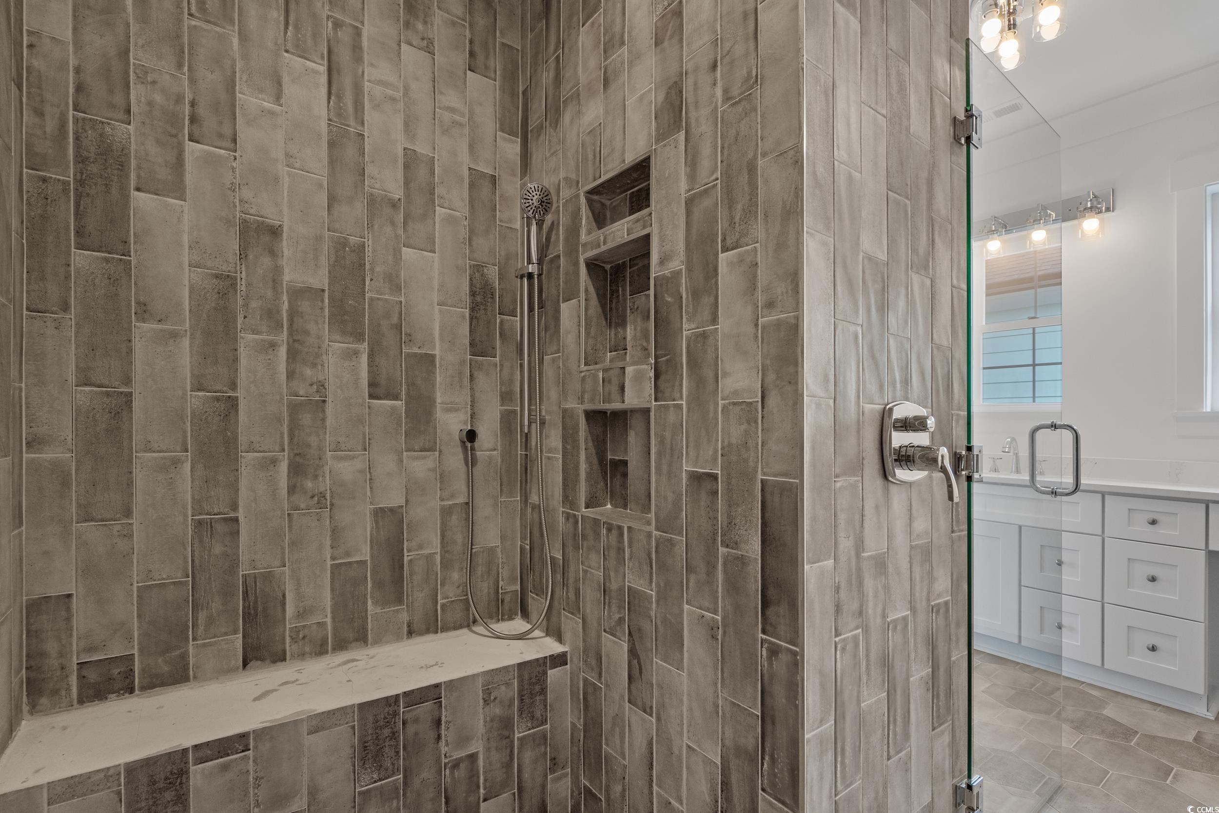 921 Crystal Water Way Myrtle Beach, SC 29579 - Photo 22 of 36 Full bath with a stall shower and vanity