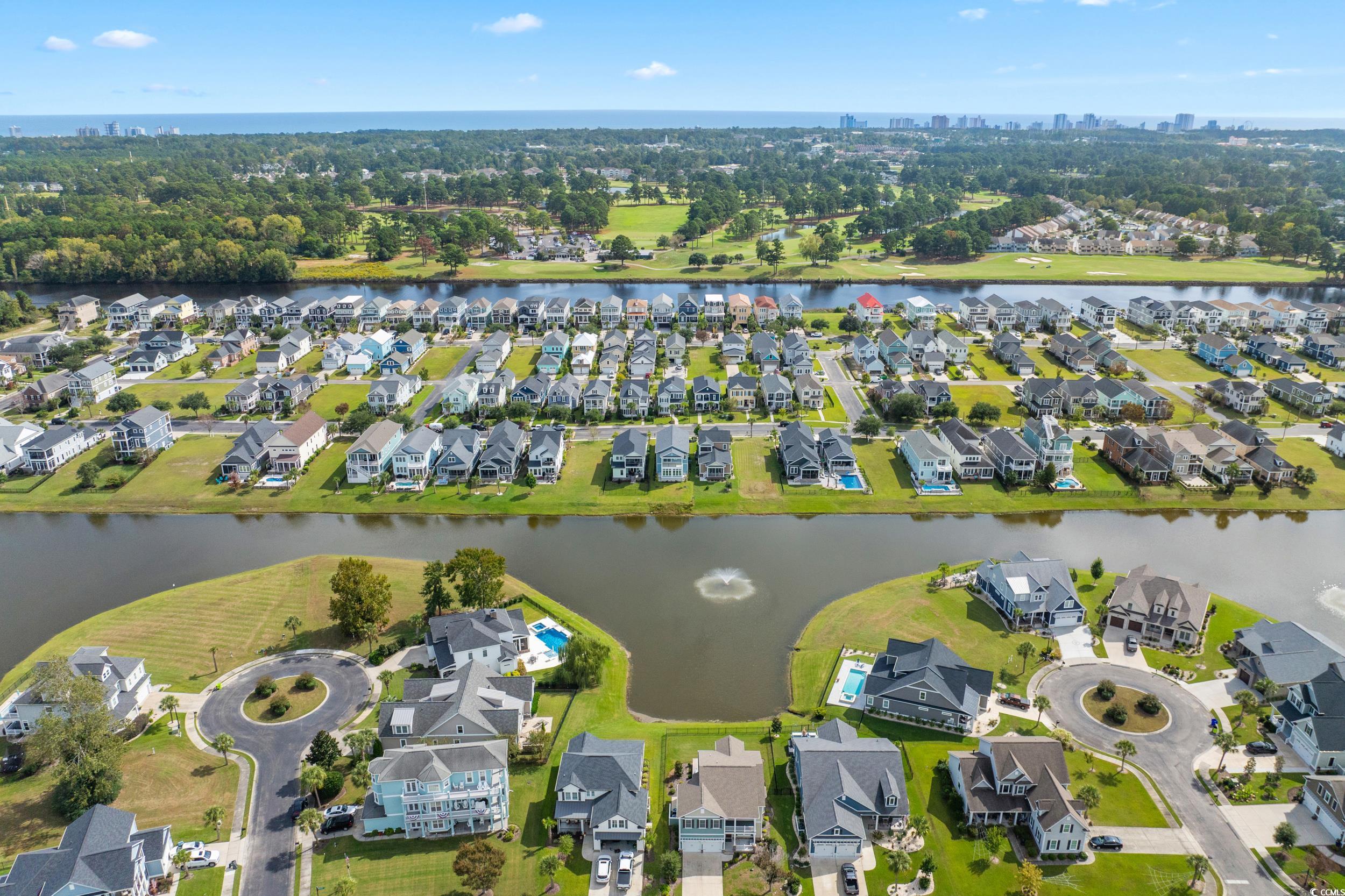 921 Crystal Water Way Myrtle Beach, SC 29579 - Photo 32 of 36 Aerial view of property and surrounding area with nearby suburban area
