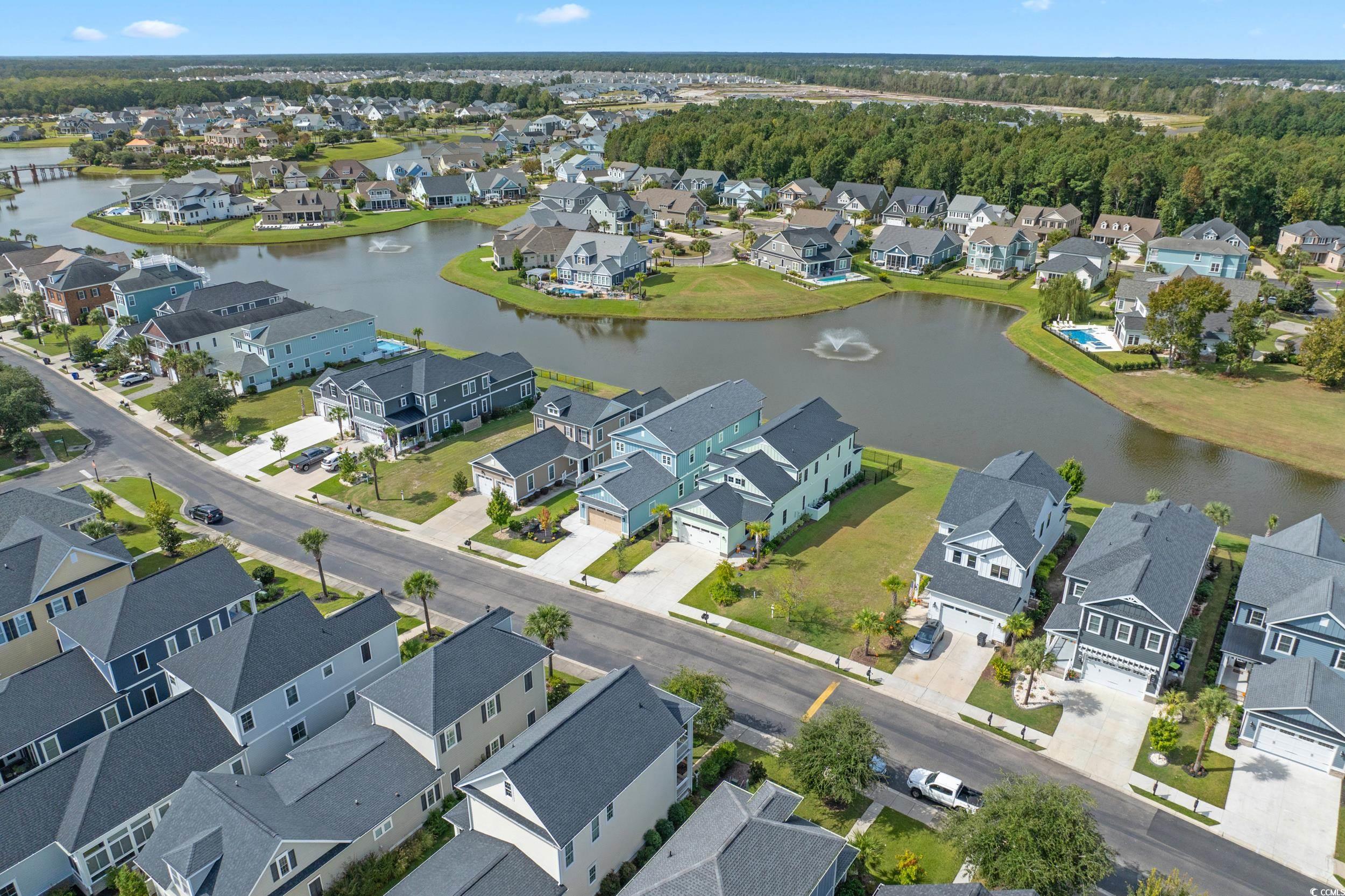 921 Crystal Water Way Myrtle Beach, SC 29579 - Photo 33 of 36 Aerial view of residential area with a large body of water