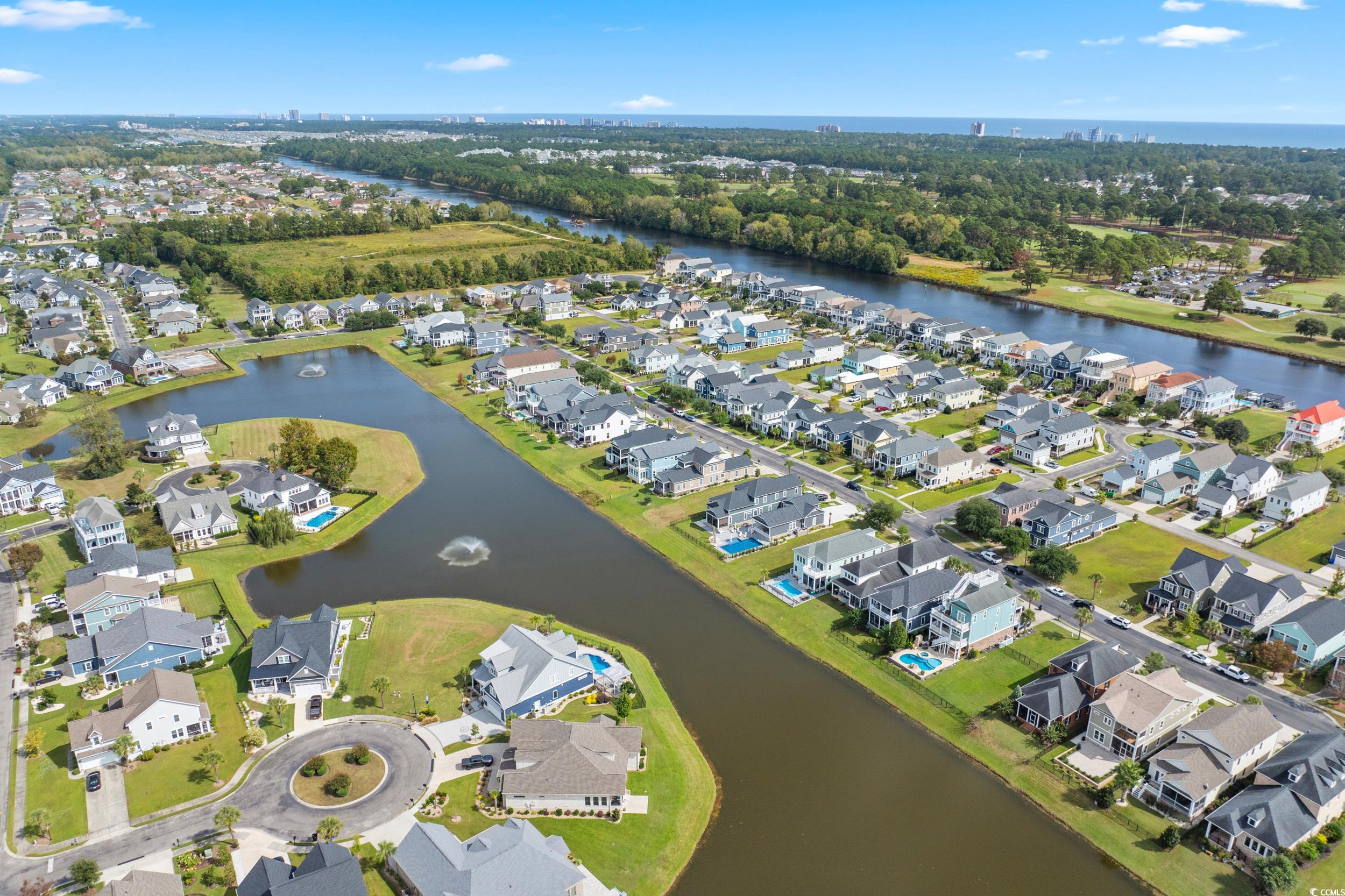 921 Crystal Water Way Myrtle Beach, SC 29579 - Photo 36 of 36 View of property location featuring a nearby body of water and nearby suburban area
