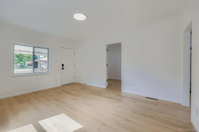 an empty room with windows