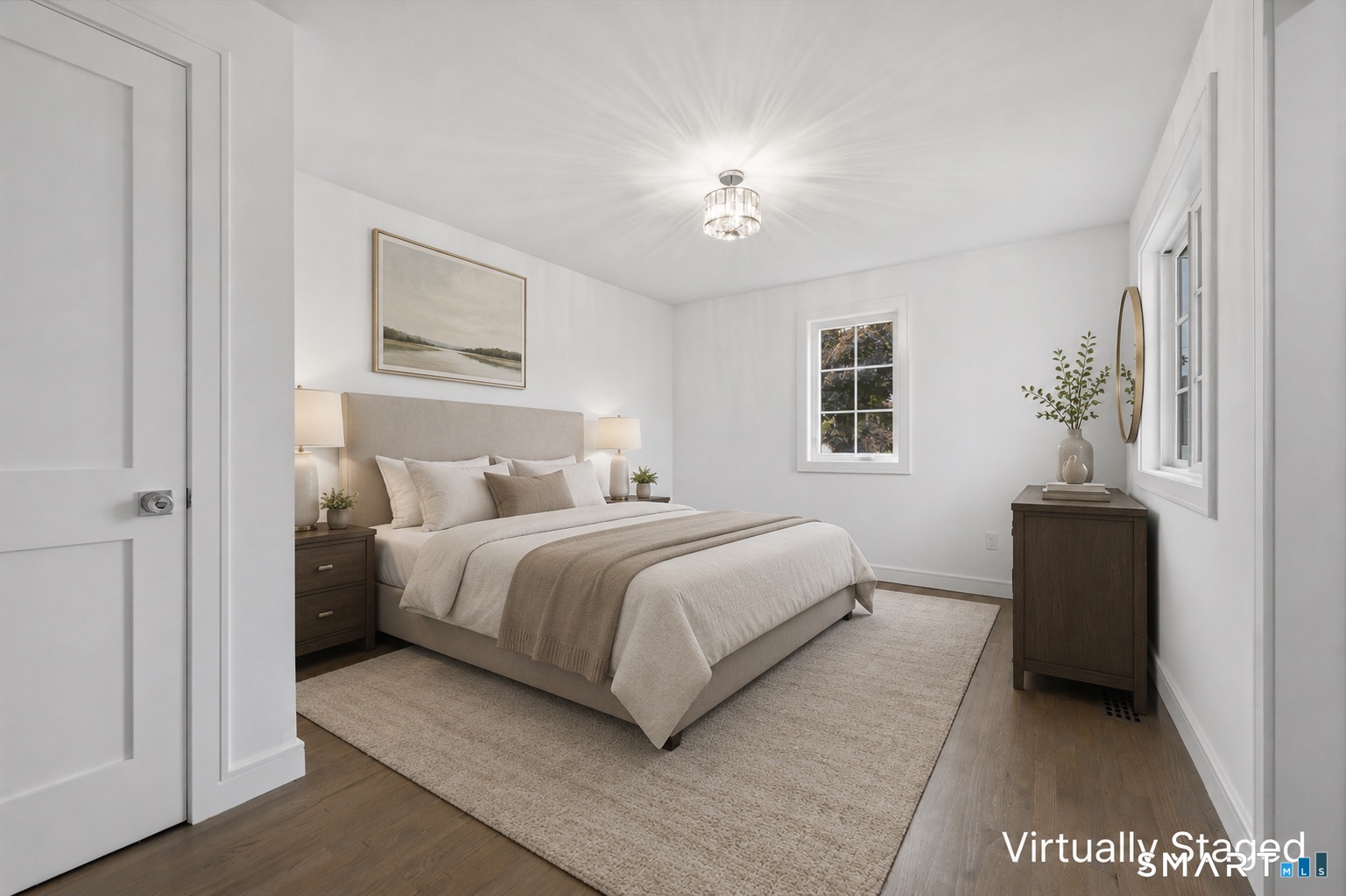 110 Russell Road Stratford, CT 06614 - Photo 14 of 31 a bedroom with a large bed and a chandelier