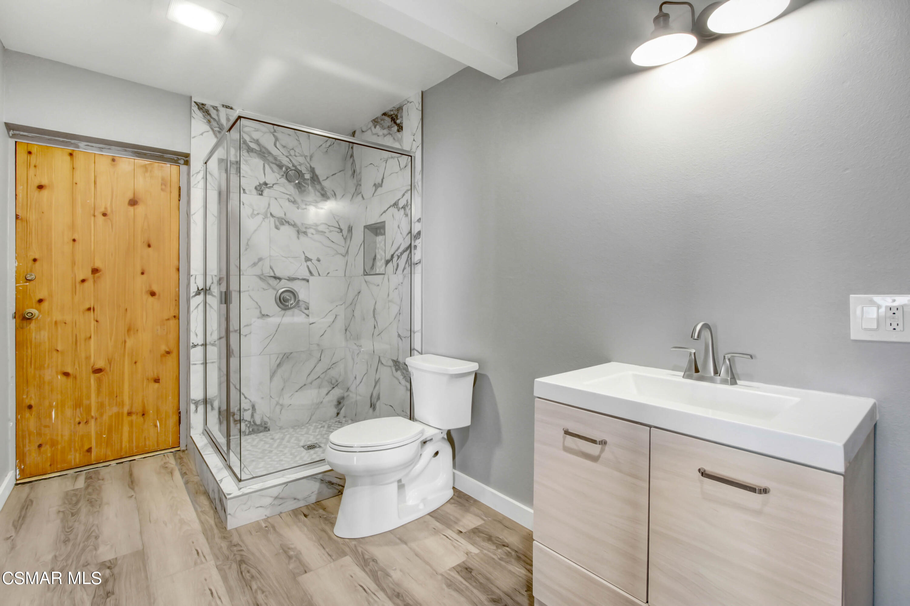 8787 Happy Camp Road Moorpark, CA 93021 - Photo 9 of 33 a bathroom with a sink toilet and shower