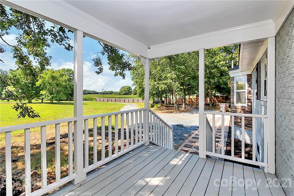 3405 Love Mill Road Monroe, NC 28110 - Photo 3 of 44 a view of balcony with wooden floor