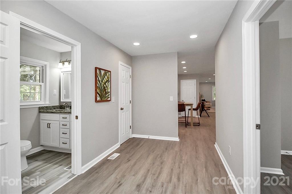 3405 Love Mill Road Monroe, NC 28110 - Photo 23 of 44 a view of hallway with wooden floor
