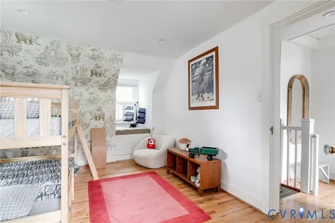 a view of livingroom with furniture and wooden floor