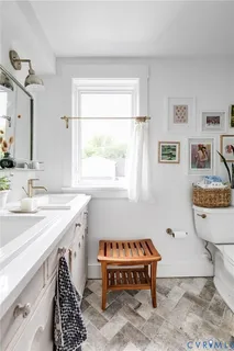 a bathroom with a shower and a bath tub