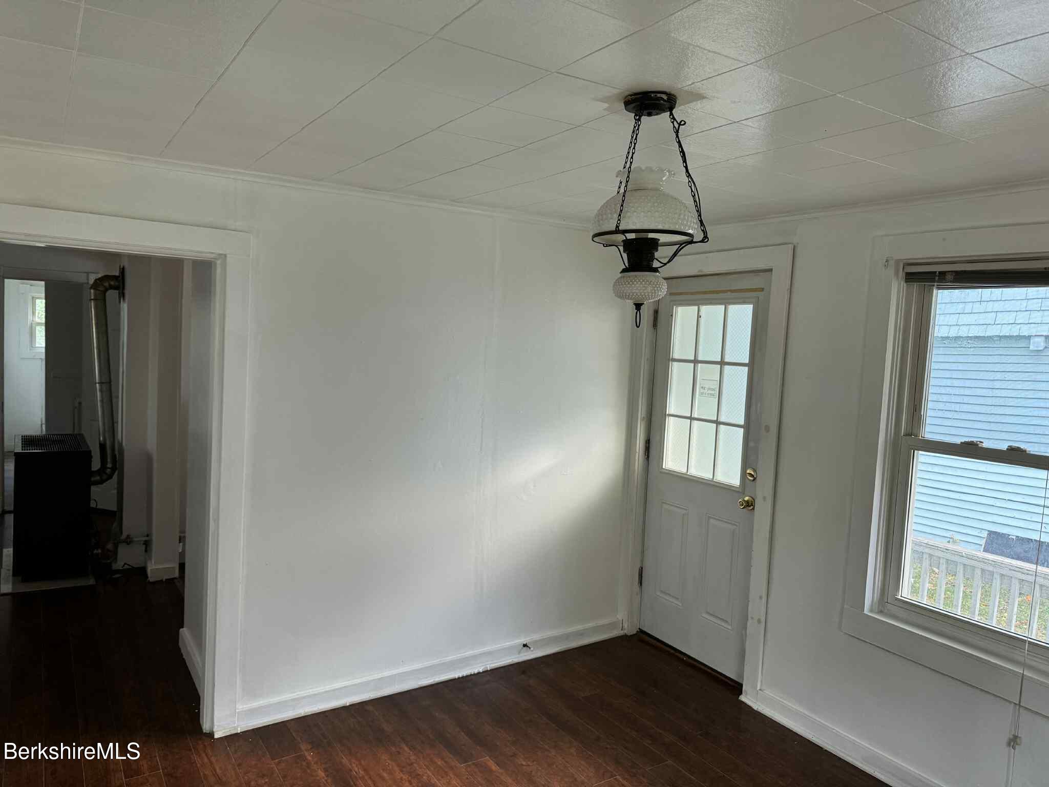7 Albert Street, Unit 1 Adams, MA 01220 - Photo 5 of 9 wooden floor in an empty room with a window