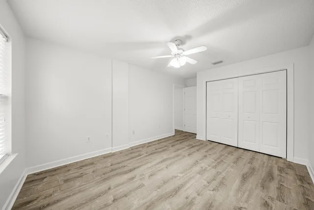 a view of a room with a large window