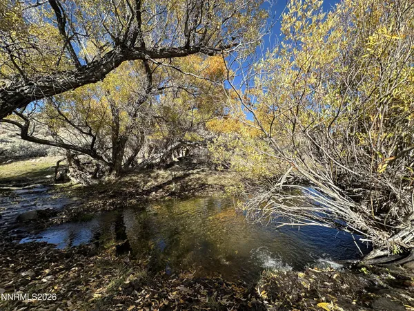 a picture of a bathroom with a shower