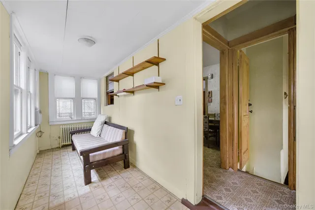 a living room with furniture and a gate
