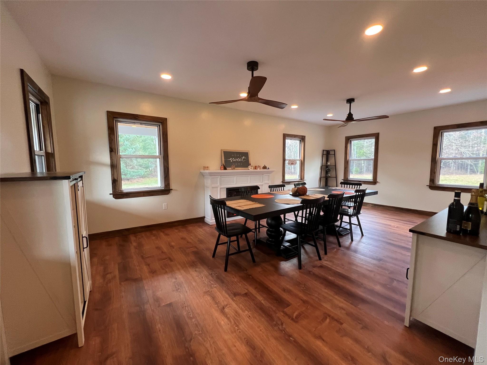 79 Dexheimer Road Narrowsburg, NY 12764 - Photo 12 of 29 a view of a dining room with furniture and wooden floor