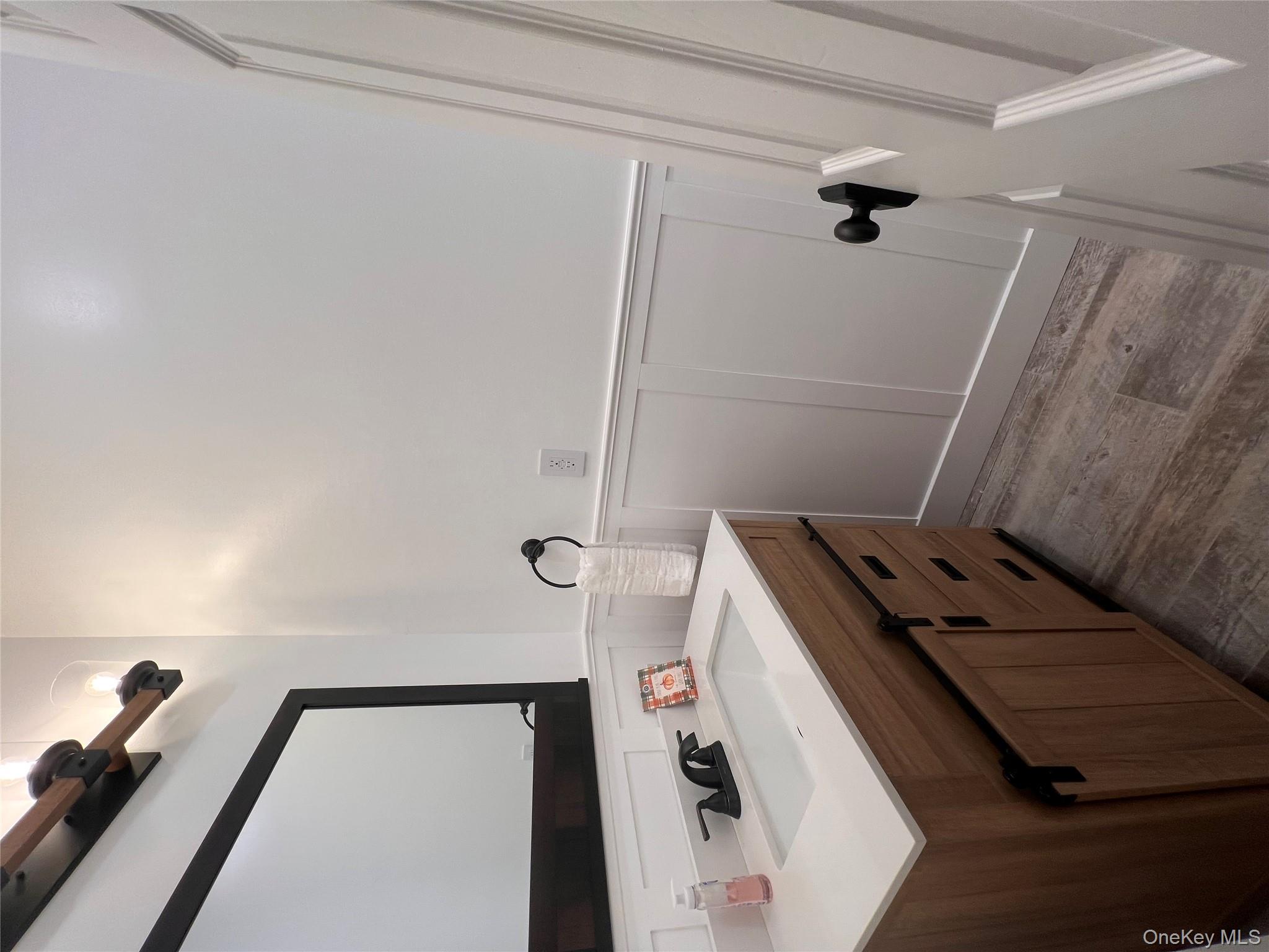 79 Dexheimer Road Narrowsburg, NY 12764 - Photo 14 of 29 a bathroom with a sink and a mirror