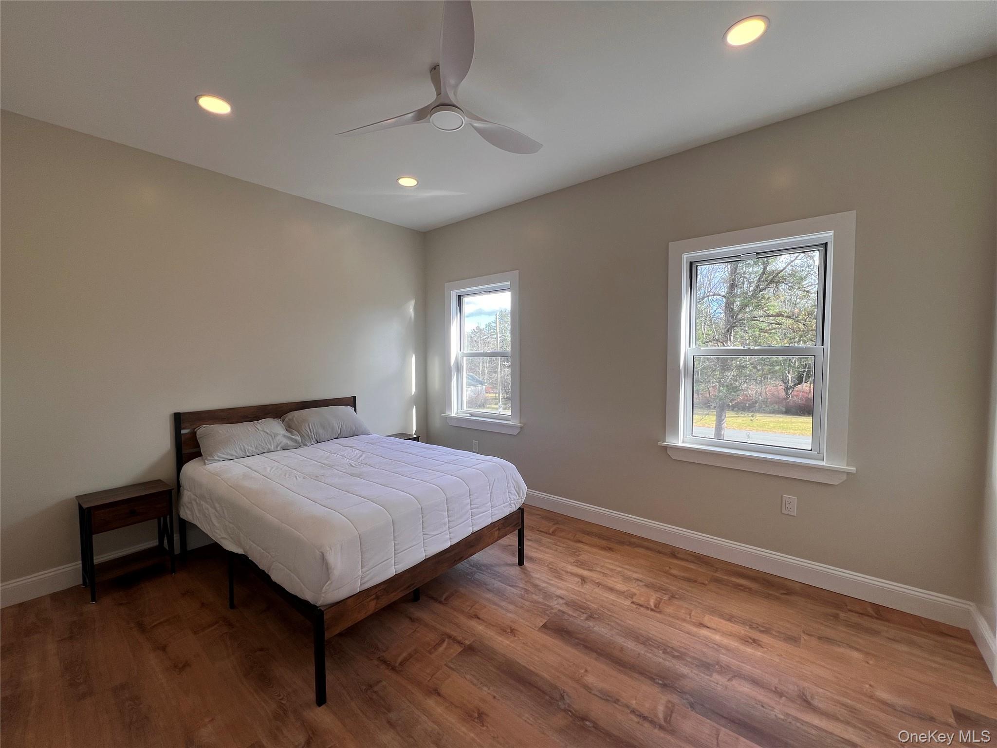 79 Dexheimer Road Narrowsburg, NY 12764 - Photo 20 of 29 a bedroom with a bed and a window