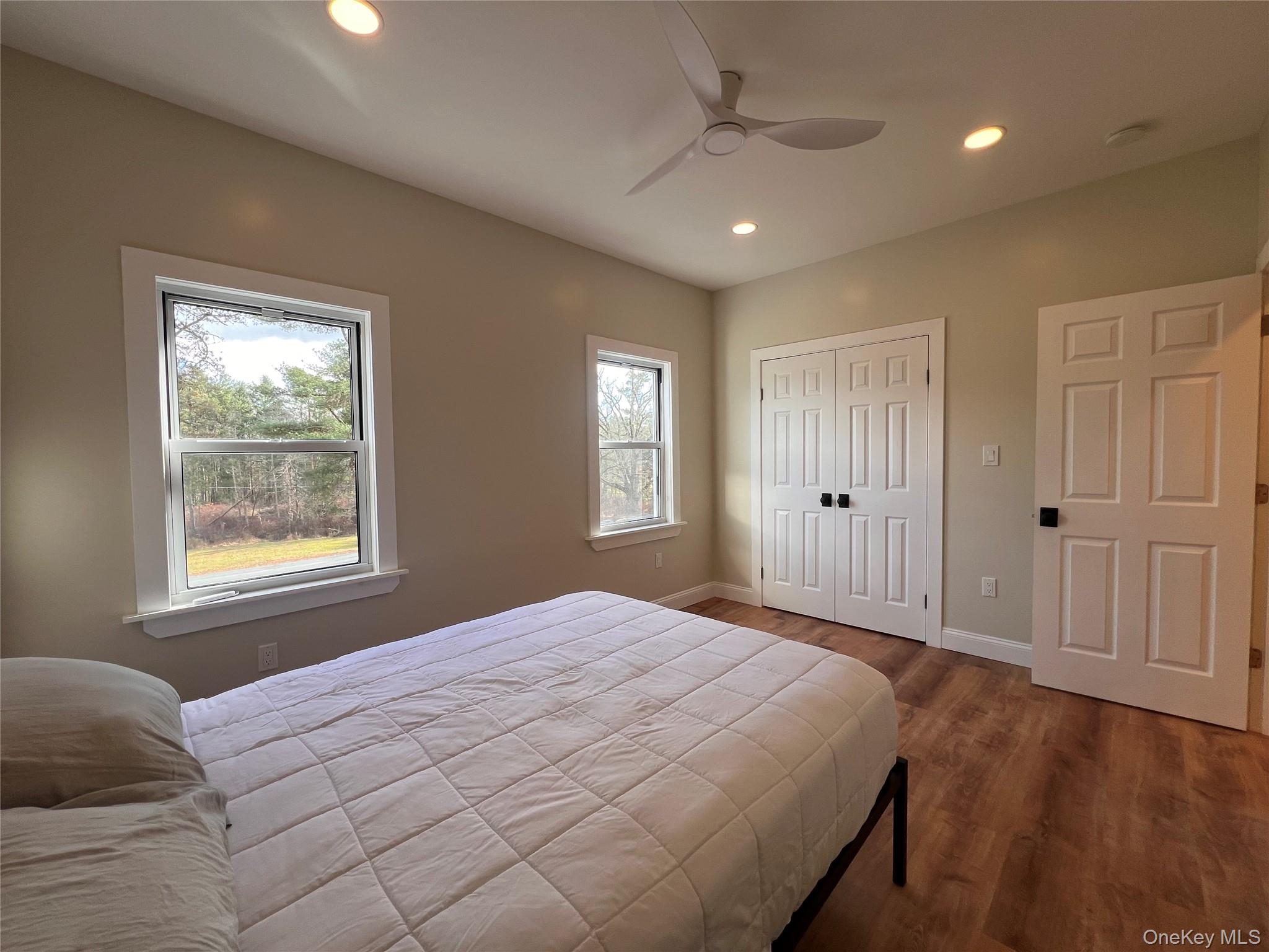 79 Dexheimer Road Narrowsburg, NY 12764 - Photo 21 of 29 Bedroom featuring wood finished floors, recessed lighting, ceiling fan, and a closet