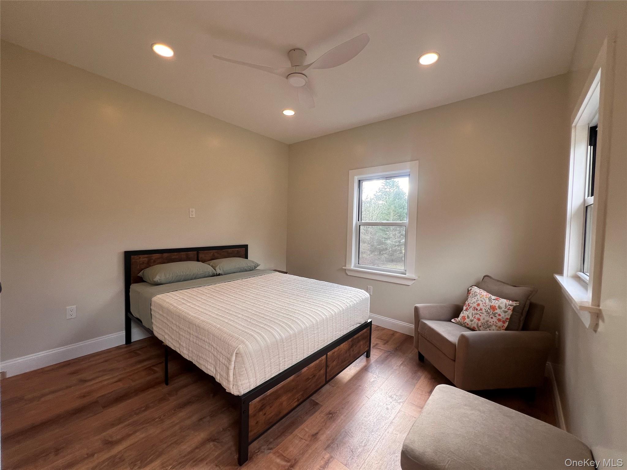79 Dexheimer Road Narrowsburg, NY 12764 - Photo 22 of 29 Bedroom with recessed lighting, wood finished floors, and ceiling fan