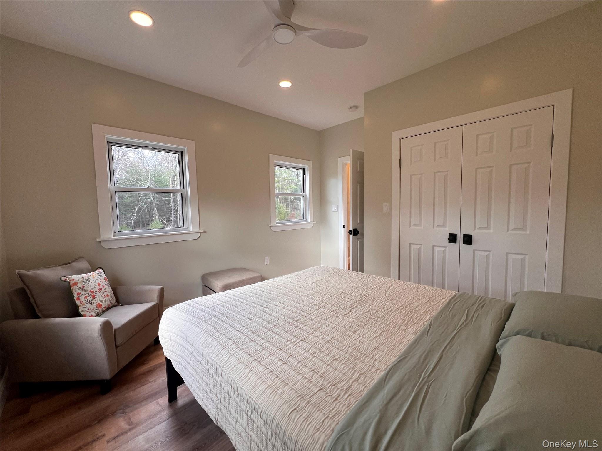 79 Dexheimer Road Narrowsburg, NY 12764 - Photo 23 of 29 a bedroom with a bed and a couch