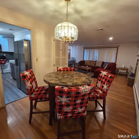 a view of a dining room with furniture